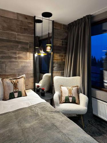 Postel nebo postele na pokoji v ubytování Grand Hotel Murgavets
