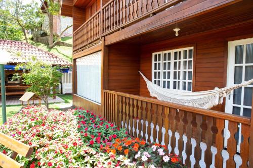 Balkoni atau teres di Incrível chalé no Hotel Fazenda China Park - ES