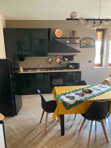 Η κουζίνα ή μικρή κουζίνα στο Villa D&C casa affitto breve