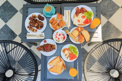 an overhead view of a table full of breakfast foods at Aerno Home & Azul Ηοme - Ahilli Slow Living in Kamari