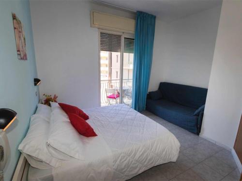 Postel nebo postele na pokoji v ubytování Hotel Giannella