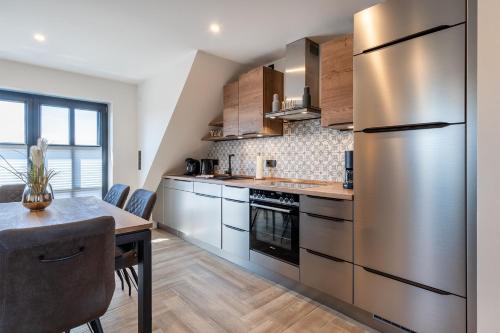 Kuchyň nebo kuchyňský kout v ubytování Vista 5, mit Balkon und drei Schlafzimmern