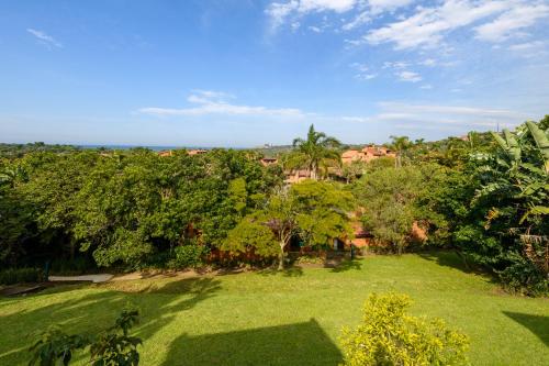 an aerial view of a yard with trees at San Lameer Villa 2409 - 3 Bedroom Standard - 6 pax - San Lameer Rental Agency in Southbroom