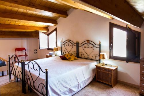 Postel nebo postele na pokoji v ubytování Baglietto del Vino Marsala