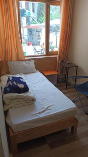 Una cama o camas en una habitación de Gonbo Guest House