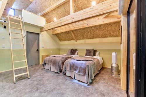 Postel nebo postele na pokoji v ubytování enico MtFuji Resort&Glamping