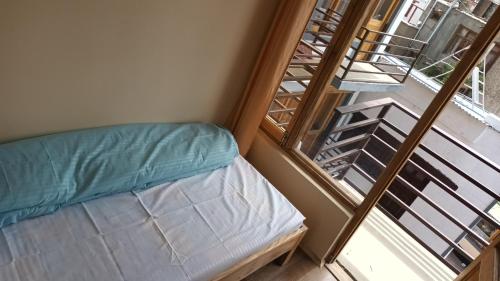 Una cama o camas en una habitación de Gonbo Guest House
