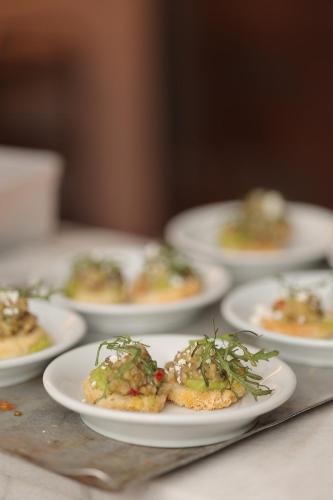 a group of plates of food on a table at Adam Boutique Eilat in Eilat