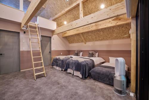 Postel nebo postele na pokoji v ubytování enico MtFuji Resort&Glamping