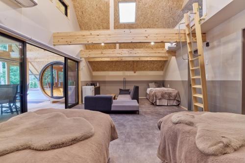Postel nebo postele na pokoji v ubytování enico MtFuji Resort&Glamping