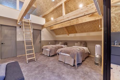 Postel nebo postele na pokoji v ubytování enico MtFuji Resort&Glamping