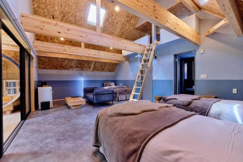 Postel nebo postele na pokoji v ubytování enico MtFuji Resort&Glamping