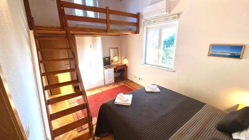 Posteľ alebo postele v izbe v ubytovaní Nautilus-Bay Holiday home with 5 rooms, on the beach, for 2-9 persons