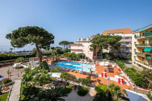 an aerial view of a resort with a swimming pool at Hotel San Michele in Celle Ligure