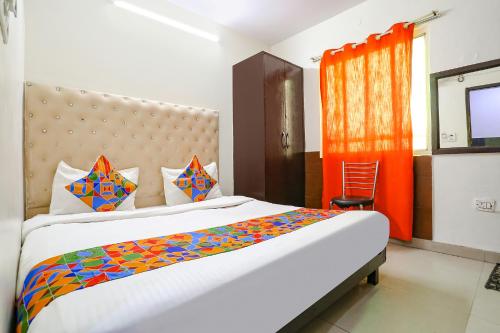 Postel nebo postele na pokoji v ubytování FabHotel The Lazeez