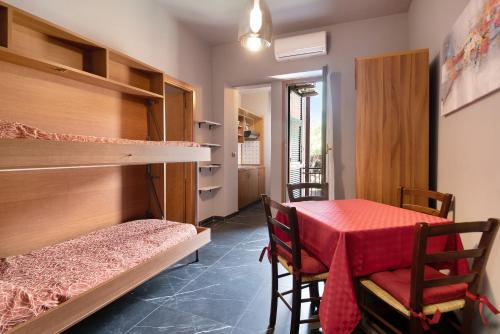 Ένα ή περισσότερα κρεβάτια σε δωμάτιο στο Residence Paradiso Bilocale 304
