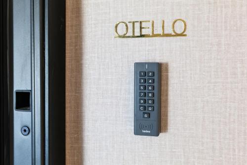 a remote control on the door of a house at PRESTIGE BOUTIQUE APARTHOTEL - Piazza Duomo View in Milan