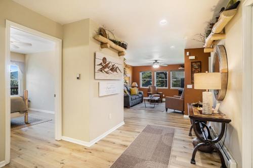 a hallway with a living room and a dining room at Aspen Grove Getaway in Estes Park