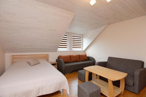 Ένα ή περισσότερα κρεβάτια σε δωμάτιο στο Ersita