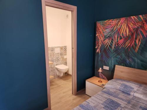 Cama o camas de una habitación en Casetta Lungomare