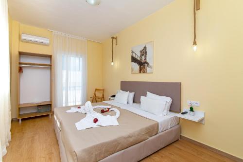 Posteľ alebo postele v izbe v ubytovaní Triton Hotel