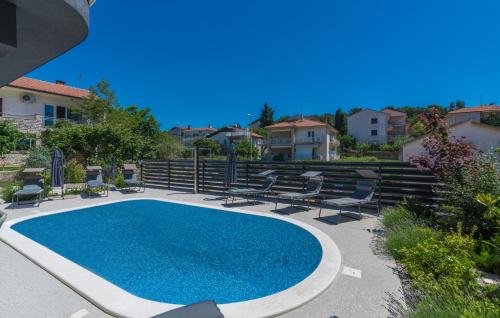 Modern apartments with shared pool near the sea