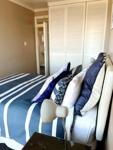 Postel nebo postele na pokoji v ubytování Dolphin View Self Catering
