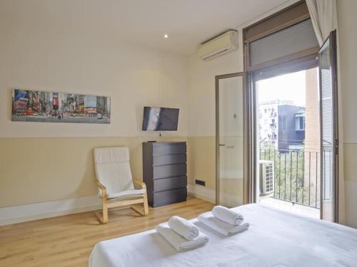 Postel nebo postele na pokoji v ubytování ¡Apartamento en el centro de Barcelona!