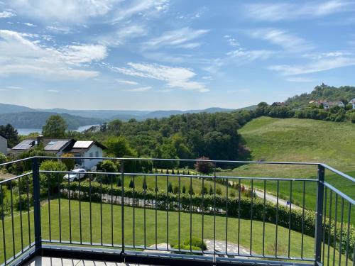 a view from the balcony of a house at Ferienhaus Eckeweg 1 in Waldeck