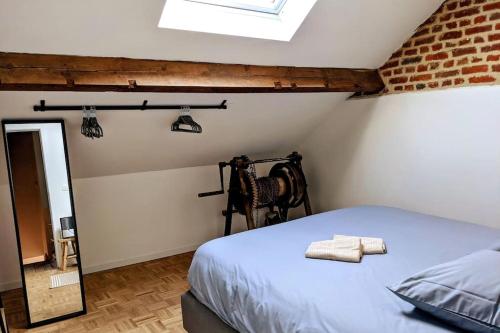 Ένα ή περισσότερα κρεβάτια σε δωμάτιο στο La Meunerie - Duplex-Terrasse 20 m2 - Polleur 6p