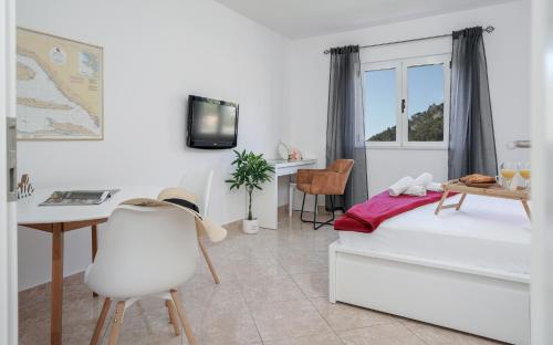 Postel nebo postele na pokoji v ubytování Downtown Hideaway - ZF Hvar