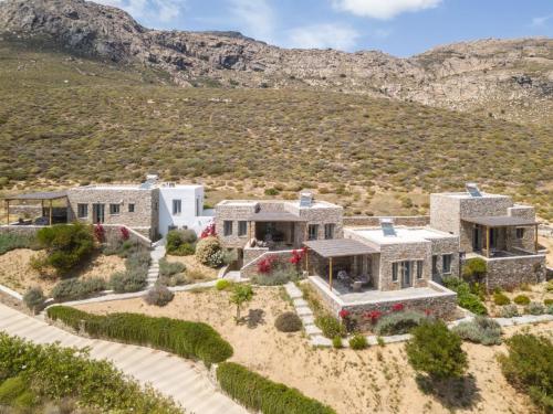 an aerial view of a large stone house in the desert at Ammoa Panorama in Alona