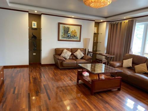 a living room with a couch and a table at citybay homestay ha long 3BR in Ha Long