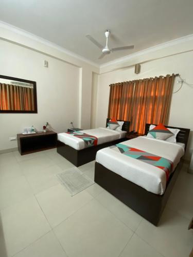 Cama ou camas em um quarto em Krishna Kunja " A Quiet & Peaceful Stay "