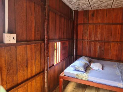 Giường trong phòng chung tại Nam Binh Homestay
