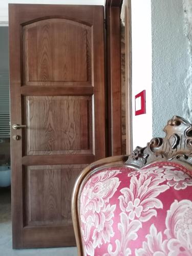 Postel nebo postele na pokoji v ubytování Deiana affittacamere e pizzeria