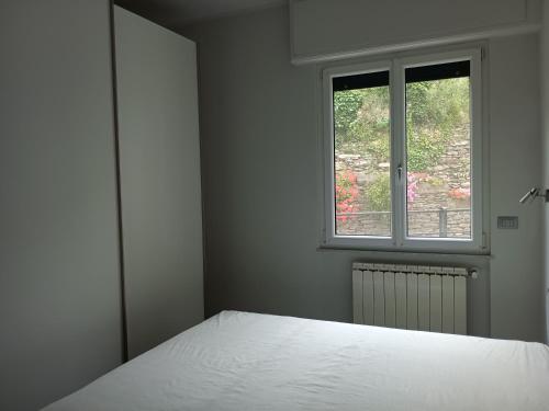 Ένα ή περισσότερα κρεβάτια σε δωμάτιο στο Casa Oliveta