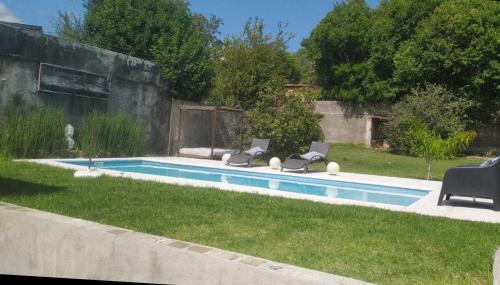 Swimmingpoolen hos eller tæt på El nono Juan casa de 3 dormitorios