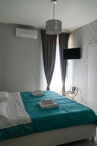 Katil atau katil-katil dalam bilik di Agriturismo il Casale