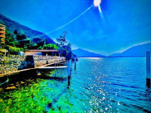 Gambar di galeri bagi Schwimmbadferien am Luganersee di Bissone