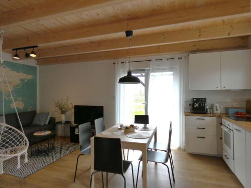 Kuchyň nebo kuchyňský kout v ubytování Domki Trzy - 2