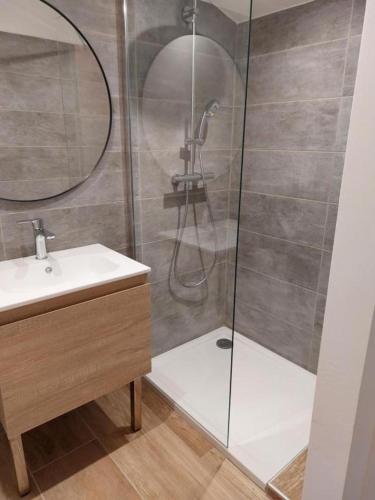 a bathroom with a shower and a sink at La Belle de Cassis in Cassis