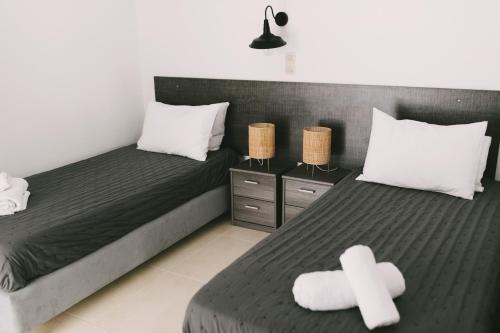 Postel nebo postele na pokoji v ubytování Grey House