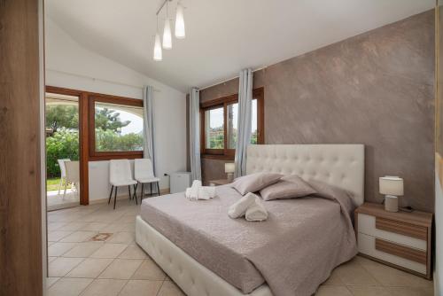 Postel nebo postele na pokoji v ubytování Rooms Tavolara