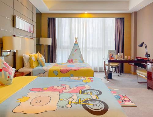 a room with two beds and a childs bedroom at Crowne Plaza Shenzhen Longgang City Centre by IHG in Longgang