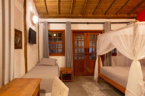 Μια τηλεόραση ή/και κέντρο ψυχαγωγίας στο Pousada Vila Serrano