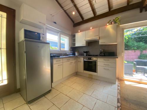 Kuchyň nebo kuchyňský kout v ubytování La maison de Mamie