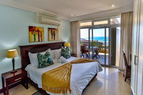 Ένα ή περισσότερα κρεβάτια σε δωμάτιο στο Sands Beach Breaks Ballito Manors
