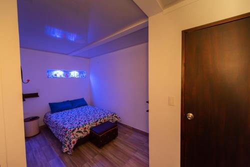 Postel nebo postele na pokoji v ubytování Apartamentos Turísticos El Conquistador