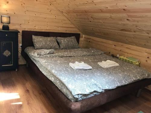 Giường trong phòng chung tại Versay Apartment